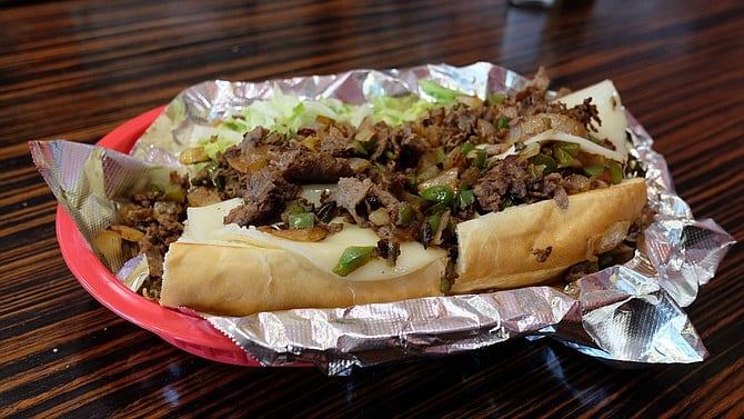 A Philly cheesesteak, of sorts — this one includes lettuce, tomato, and avocado.