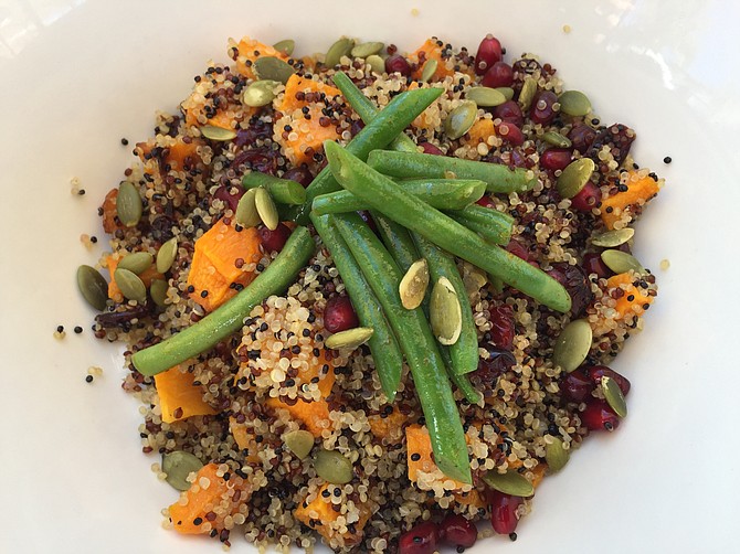 The Quinoa Salad at Sheldon's Service Station features roast butternut squash, dried cranberries, green beans, pepitas and pomegranate seeds.