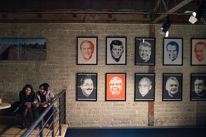 Framed portraits of Mexican and American presidents on the walls of Cine Tonalá