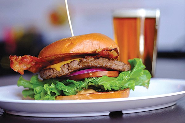 Rey Knight, owner and brewmaster of Finest Made Ales, recommends pairing Alpine Beer Company’s McIlhenney’s Irish Red with a bacon cheeseburger from Anny’s Fine Burgers.