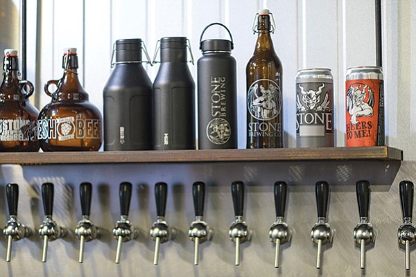 Stone Brewery taps, growlers, meowlers, and crowlers