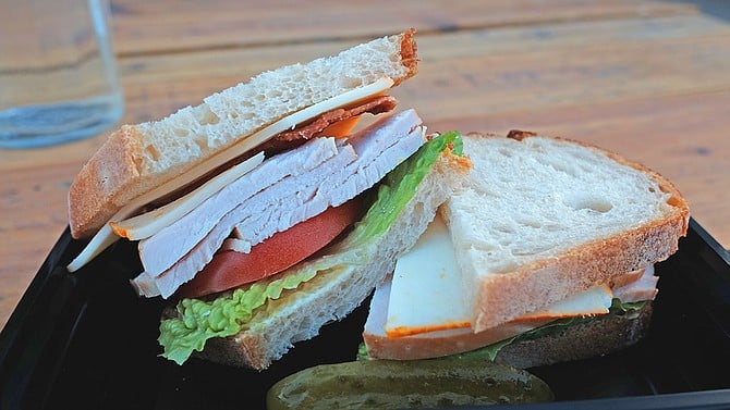 Thick cuts of turkey and tomato make this simple sandwich a bargain.