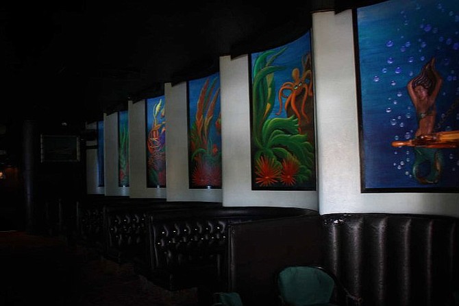 Undersea murals that glow under black lights