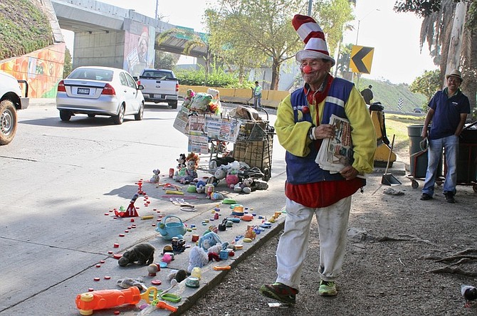 A trail of toys and other plastic items marks Pepe Nacho's sales territory.