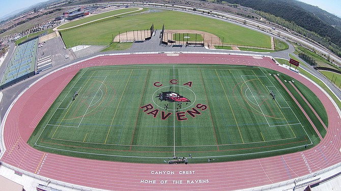 “Synthetic turf has its place in today’s world and natural grass has its place when maintained correctly." Natural and synthetic turfs installed side-by-side at a Carmel Valley school. (courtesy Byrom-Davey)