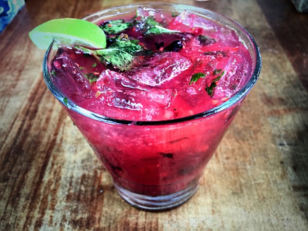The Blackberry Mojito, a citrusy, lightly sweet, herb-infused cocktail perfect for a hot evening