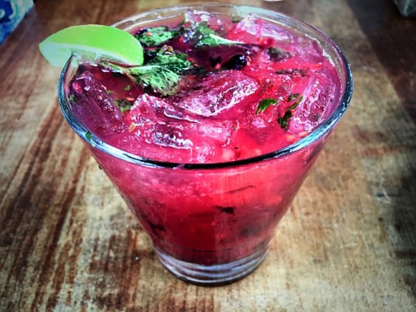 The Blackberry Mojito, a citrusy, lightly sweet, herb-infused cocktail perfect for a hot evening