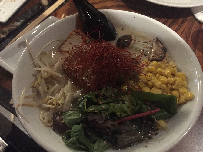 The vegan ramen comes with a variety of fresh veggies, as well as tofu.