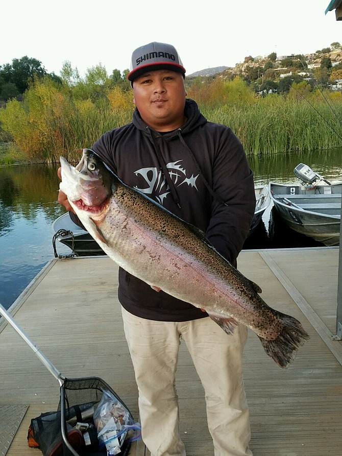Daniel Fernandez (of Downey) catches the largest trout at the 2016 Lake Wohlford opener