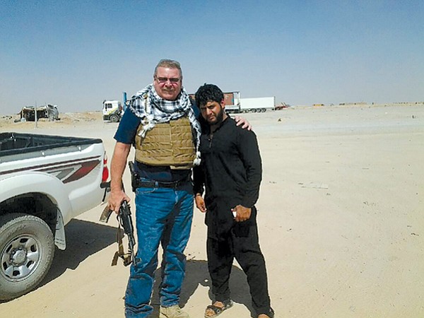 Dave Sossaman and Sher Mohammad Haidari in Afghanistan