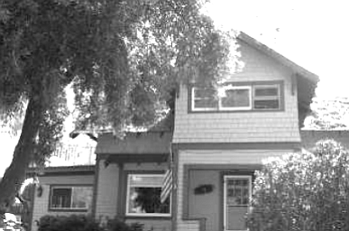 The La Mesa family home. "I grew up, in this nifty two-story house built about 1900 on an acre of land."

