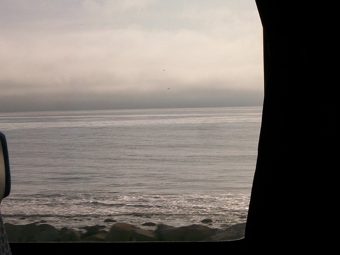 North County beach thru Amtrak window heading north.
