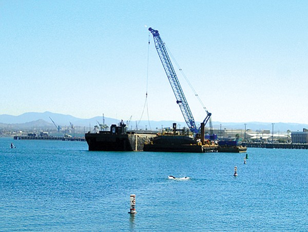Dredging barge in the middle of Glorietta Bay, where it was kept during the day before being moved over to the 
piers at night where the dredging took place.