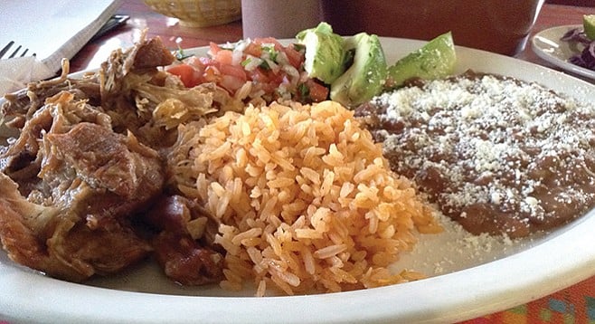At El Pachanguero, carnitas with rice and frijoles go down easy
