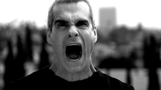 Punk-rock hot head Henry Rollins has the mic at the Observatory on Tuesday.