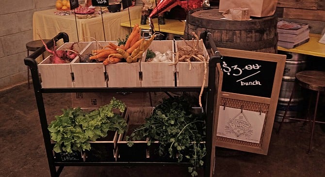 The small farmers' market stand appearing at Machete Beer House Monday nights from 7 to 9 p.m.