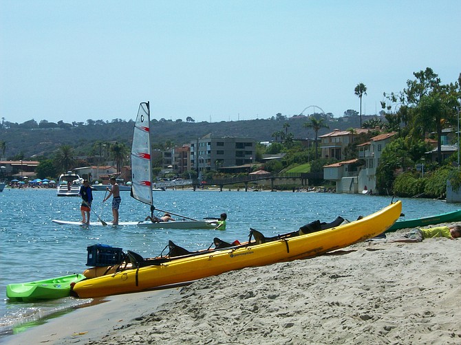 Kayaks and paddle-boards along San Diego Bay.