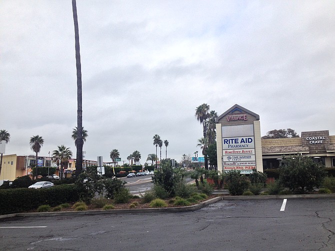 Entrance to shopping center from Clairemont Drive.  