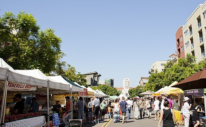No market starts out like an average day at Little Italy’s farmers' market. 