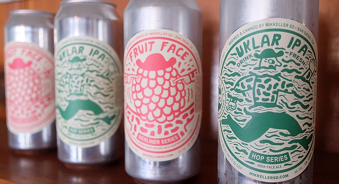 Sticker labels on blank silver cans allow Mikkeller San Diego to release a new, small batch beer every week in 2017.