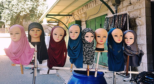 Valley of the Hajib Dolls... outside a shop in Nazareth.

