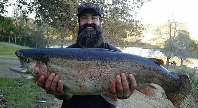 Steve Capps caught a record-breaking 16.41-pound trout at Lake Dixon in December.
