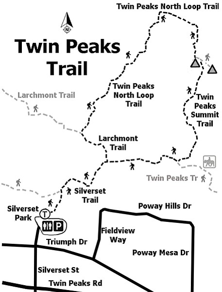 Twin Peaks' summit trail is located at the high point along the ridge.