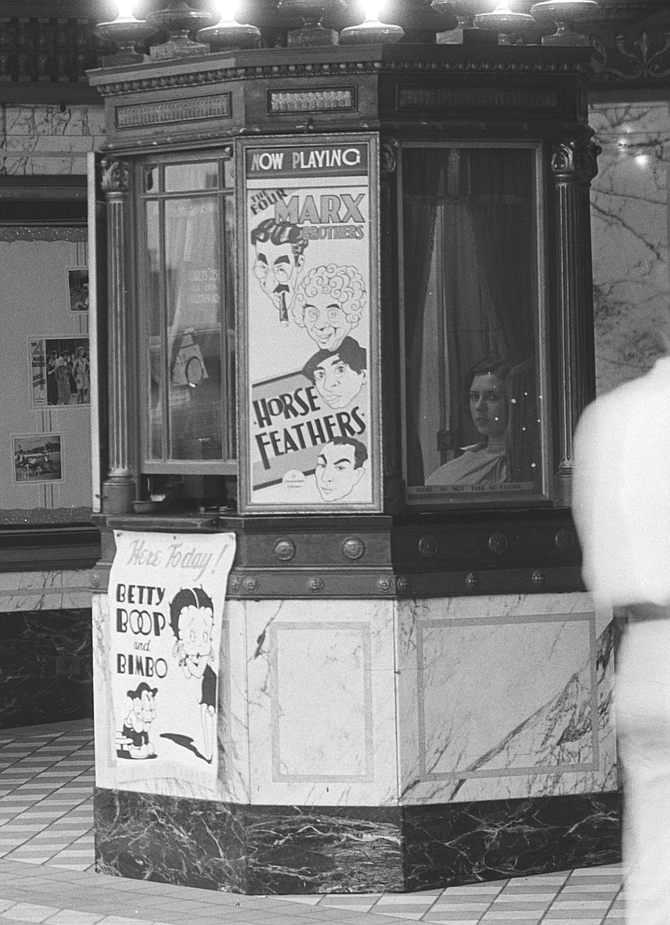 Once the Betty Boop and Bimbo banner and Horse Feathers insert-poster have been admired, check out the turned-off ticket vendor. The look on her face is a reminder that a good portion of a theatre employee's workday is time spent in boredom.
