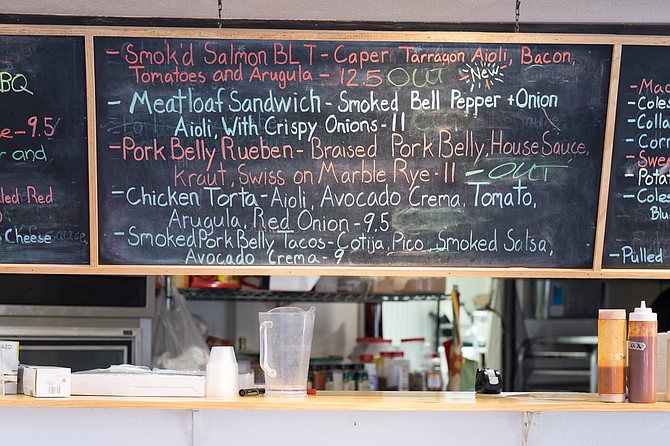 Sandwich options (when not out) include a Smok'd salmon BLT, pork belly Reuben, chicken torta, and a meatloaf sandwich.