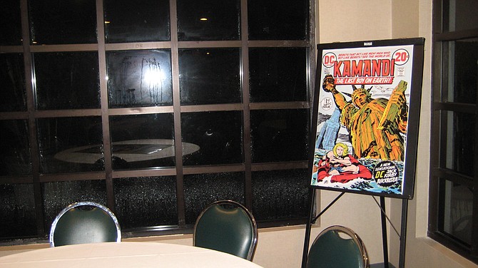 The Comic Fest Café celebrating the Jack Kirby Centennial. The rain outside reminds me of the Kamandi comic book cover