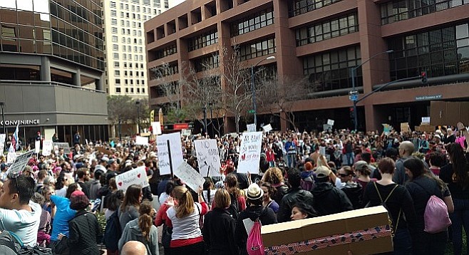 The march ended in front of federal buildings downtown.