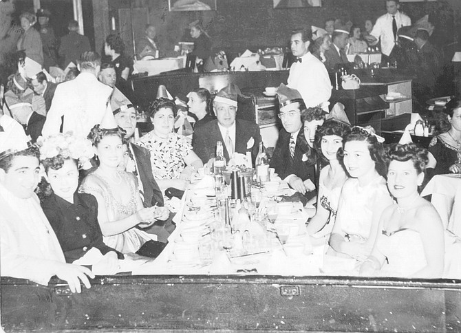 From left: Frankie Drangna, Frankie’s date, Marie Adamo, Momo Adamo, Frances Dragna, Jack Dragna, Frank Desimone, Anna Dragna (third from right), Mary Ann (far right); New Year’s Eve, 1947