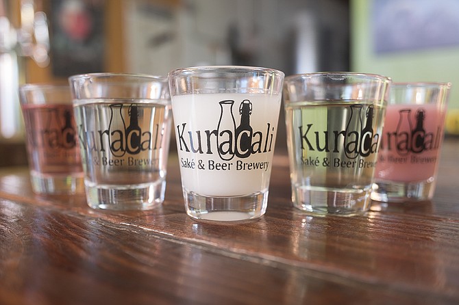At Kuracali, traditional filtered and cloudy sakes are offered, along with fruit flavors such as blood orange, kiwi, and blackberry.