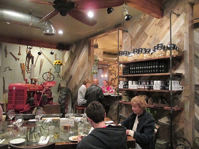 There is an actual farmer's table in the room where diners can eat family-style.