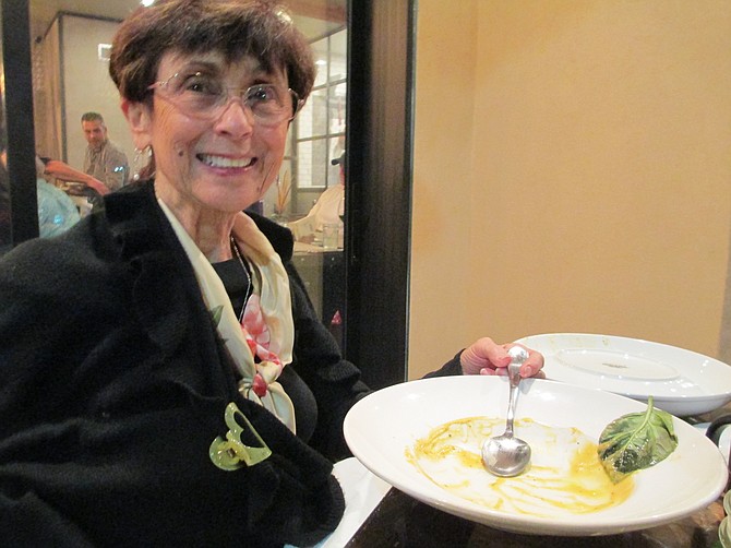 Mom at all of her butternut squash soup at Farmer's Table.