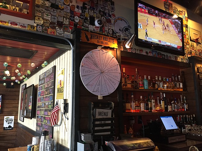 For $5, you can spin a wheel and leave your choice of whiskey up to chance.