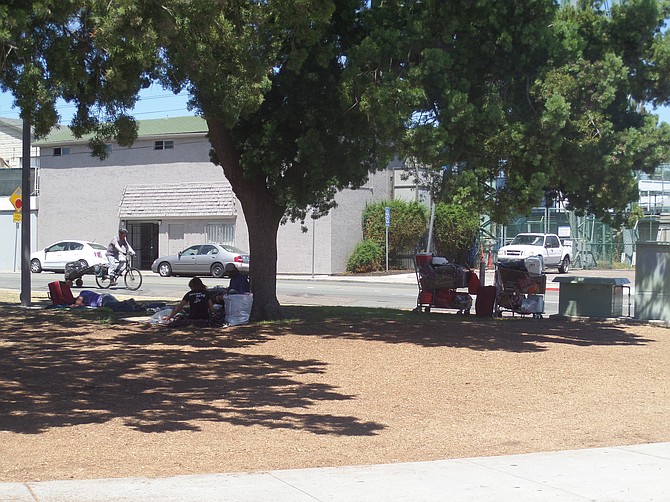 North Park Park, homeless trying to rest during the day, just before Amikas.org "Tiny Homes(houses)" has a News conference on San Diego Homelessness Awareness Day 2016