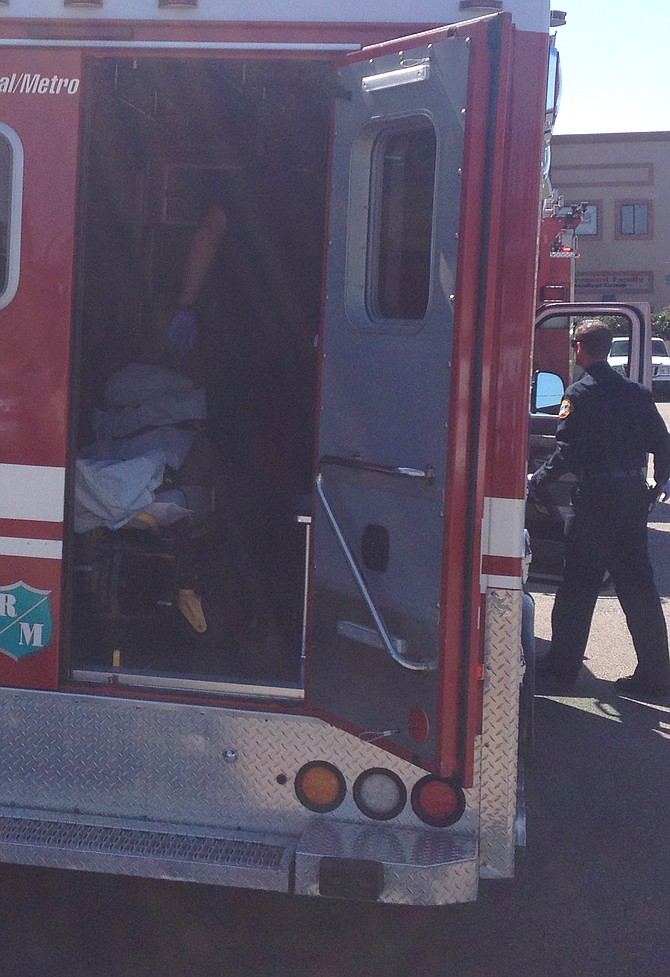 010 Thief in ambulance being taken away