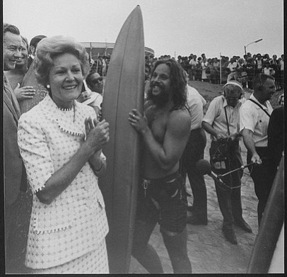 One of the crew trying to avoid contact with Pat Nixon. 