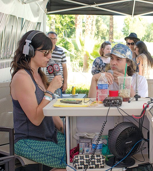 Hilary Chambers (here interviewing Adam Granduciel of War on Drugs) feels “Bird’s Surf Shed is very San Diego.” - Image by Andy Boyd