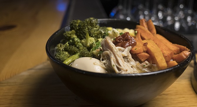 Chicken confit ramen with carrots and broccoli added