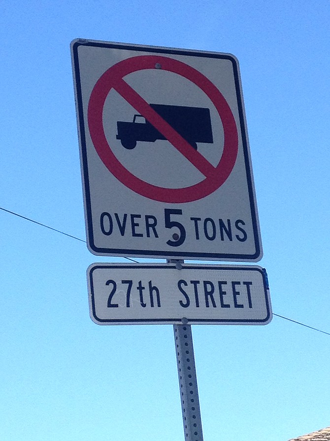 Signs like this one are posted everywhere in Barrio Logan near the Port.