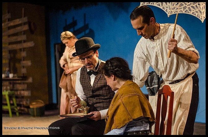 Jacque Wilke, David Raines, Jessica John, and Francis Gercke (with umbrella) search for the elephant in Moxie Theatre's Abundance - Image by Studio B Photo Productions