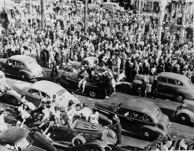 Horton Plaza, V-J Day, 1945. "Virtually overnight San Diego changed character from an isolated, quiet little town to a frenetic city overflowing with strangers."