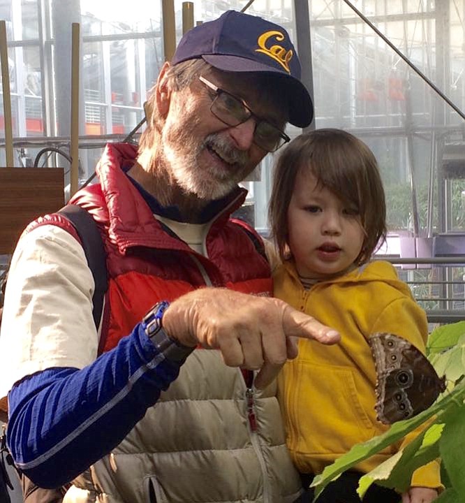 Grandpa pointing out a Blue Morpho Butterfly