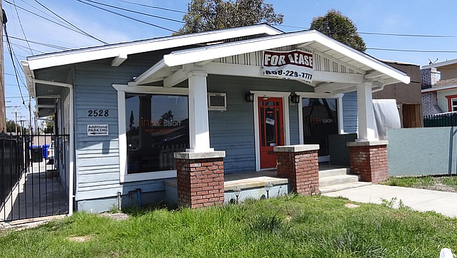 Rinse salon moved out of their old Craftsman house at 2528 University Ave.