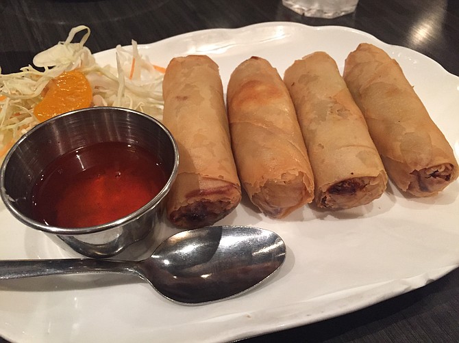 The Yummy Sticks, fried veggie egg rolls served with a plum sauce. Careful, they arrive lava hot.
