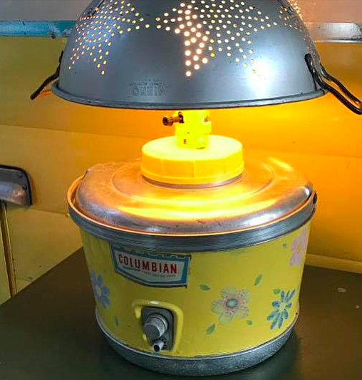The matching yellow Columbian water jug that was transformed into a lamp. 