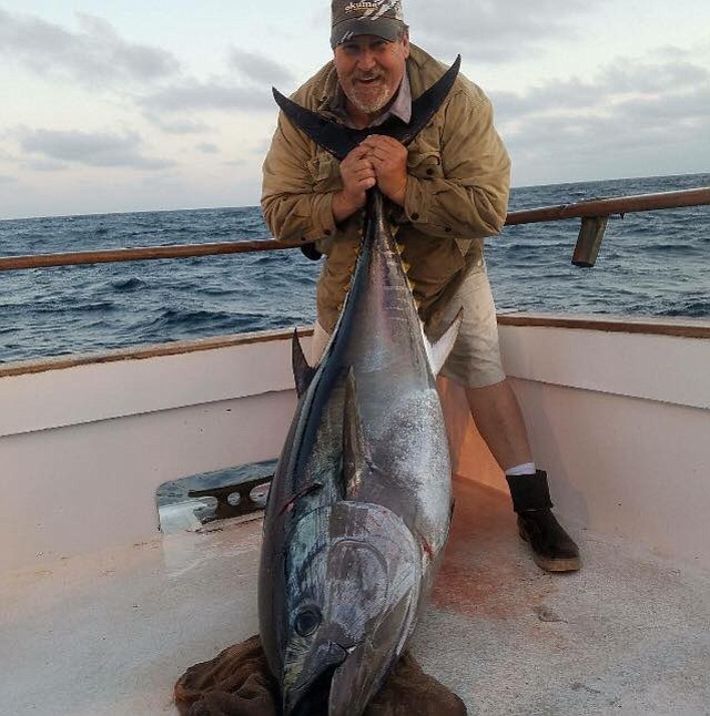 Steven Welsh with 209.8-pound bluefin tuna.
