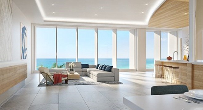 Slider window walls open the residence to the ocean.